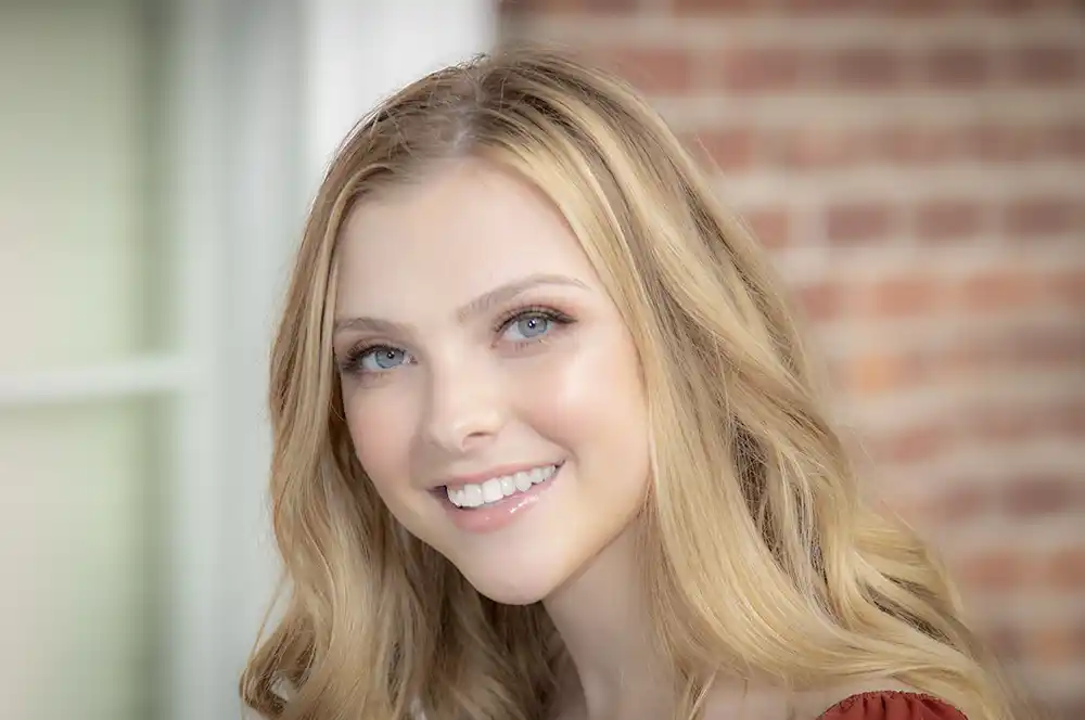 A 'before' portrait of a model, shown before our glamour retouching service is applied to it.