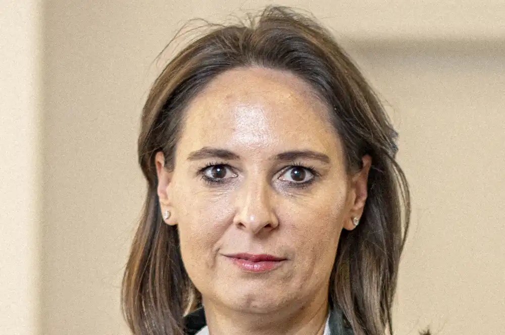 A portrait of a person shown before any face and portrait retouching has been done.